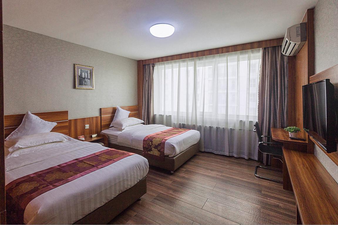 מנג' Beiguo Zhichun Business Hotel מראה חיצוני תמונה
